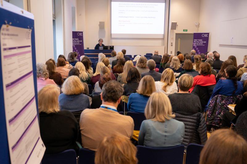 Professor Iram Siraj addresses a packed room of delegates at the Early Years Summit