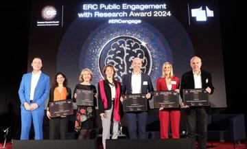 Professor Lucie Cluver on stage alongside fellow winners of the ERC Public Engagement Awards 2024